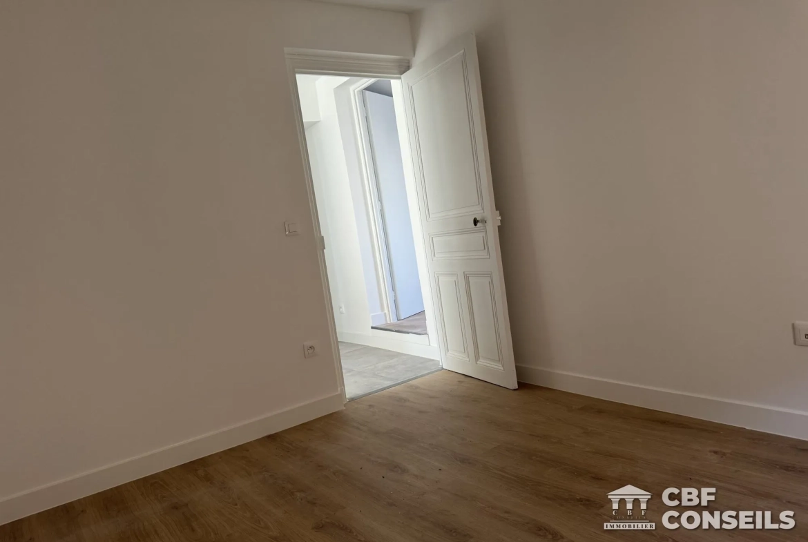 Appartement T3 rénové à Riom (63200), centre-ville avec vue et potentiel d'aménagement 
