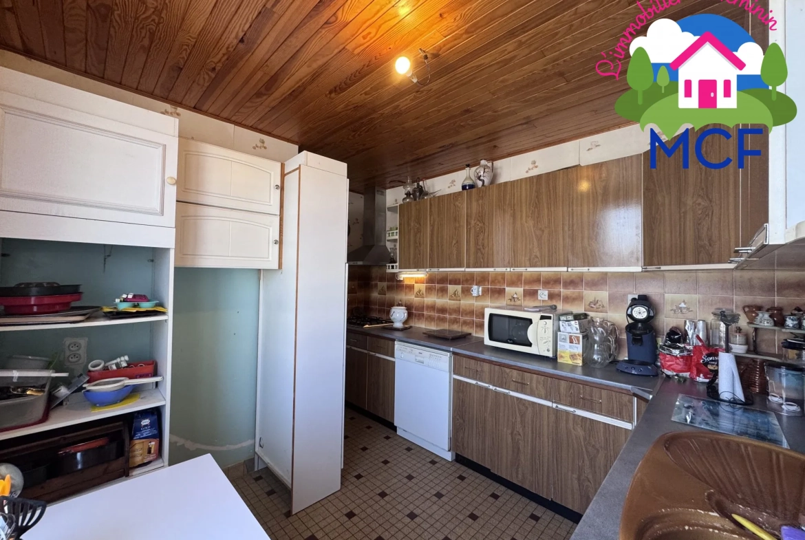 Maison traditionnelle avec sous-sol, jardin et atelier à Anet 