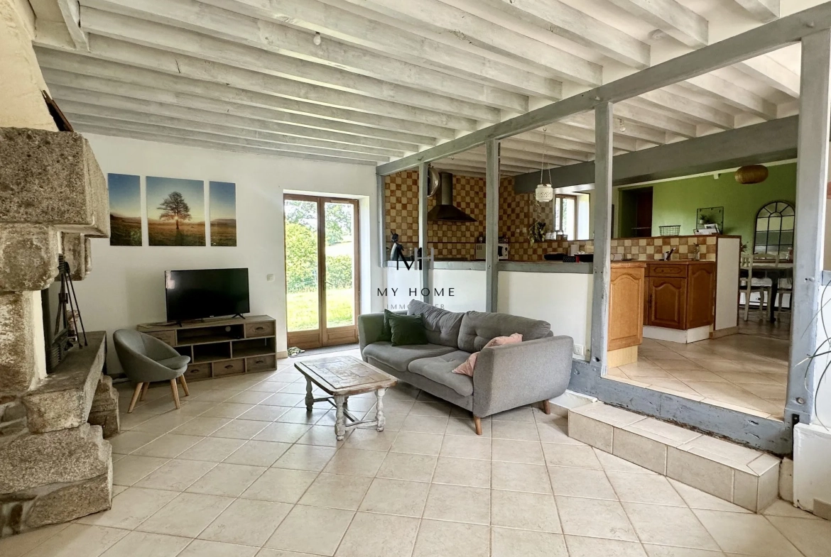 Longère décorée avec goût à Pré-en-Pail – 5 chambres, grand terrain, énergétiquement performante 