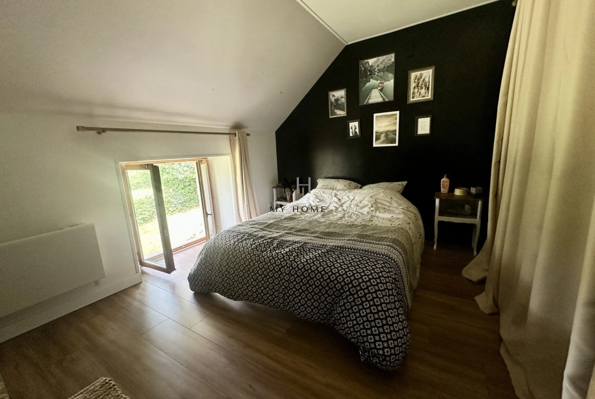Longère décorée avec goût à Pré-en-Pail – 5 chambres, grand terrain, énergétiquement performante 