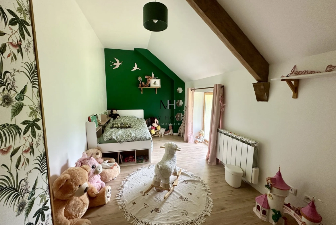 Longère décorée avec goût à Pré-en-Pail – 5 chambres, grand terrain, énergétiquement performante 