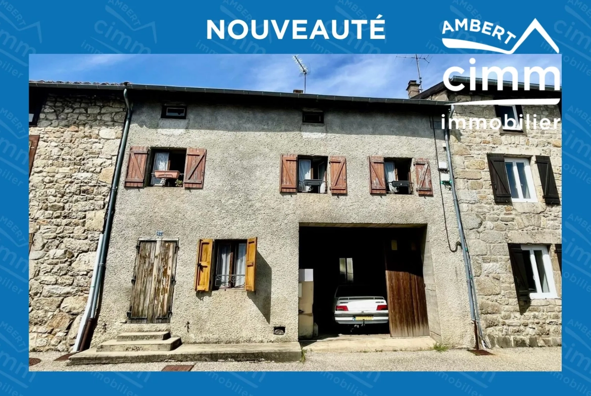 Charmante maison de ville à Saint-Anthème à vendre avec garage et potentiel de rénovation 