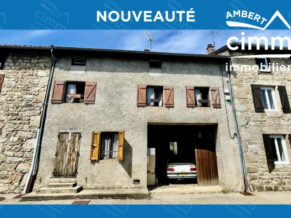 Charmante maison de ville à Saint-Anthème à vendre avec garage et potentiel de rénovation