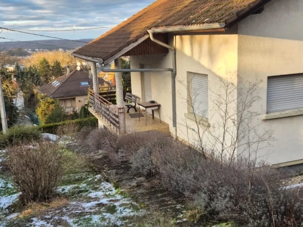 Maison 148 m² à Oeting avec grand terrain et garage, emplacement stratégique