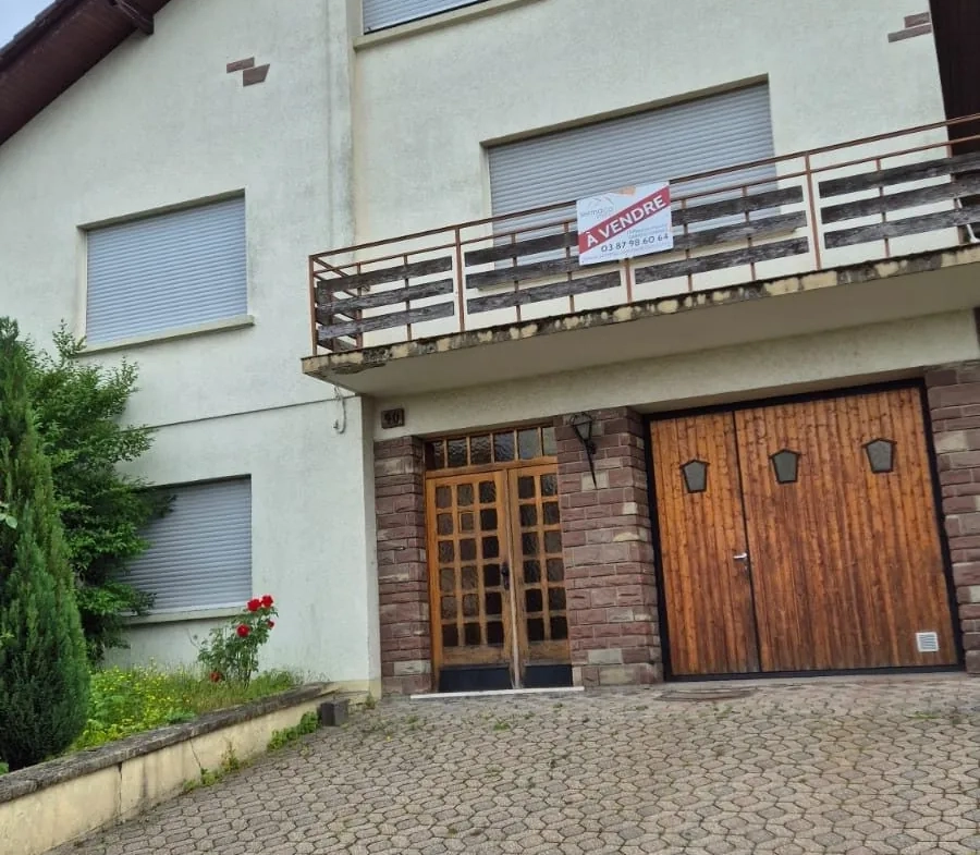 Maison 148 m² à Oeting avec grand terrain et garage, emplacement stratégique 