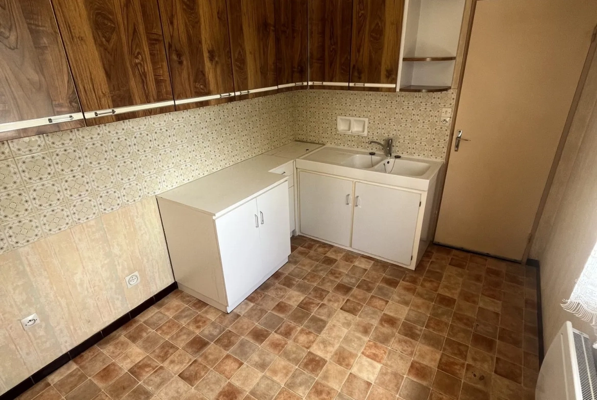 Maison de plain-pied à Condat-sur-Vienne avec jardin et garage, 48 m² 