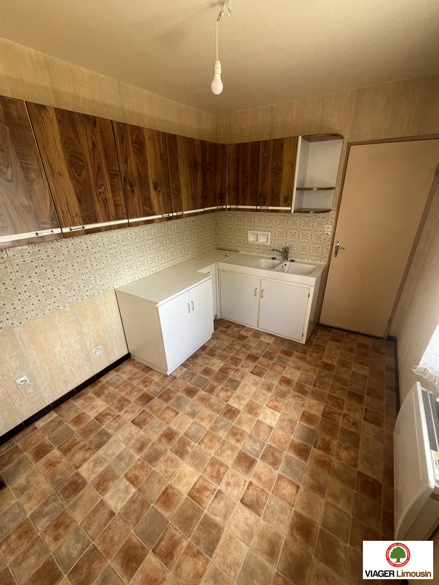 Maison de plain-pied à Condat-sur-Vienne avec jardin et garage, 48 m² 