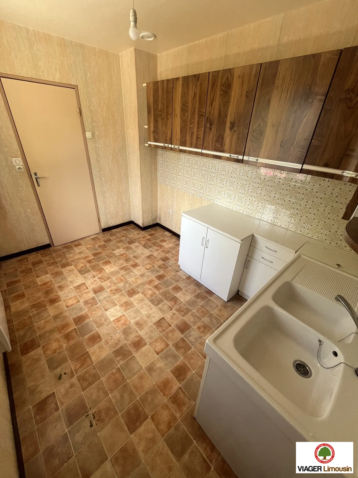 Maison de plain-pied à Condat-sur-Vienne avec jardin et garage, 48 m² 