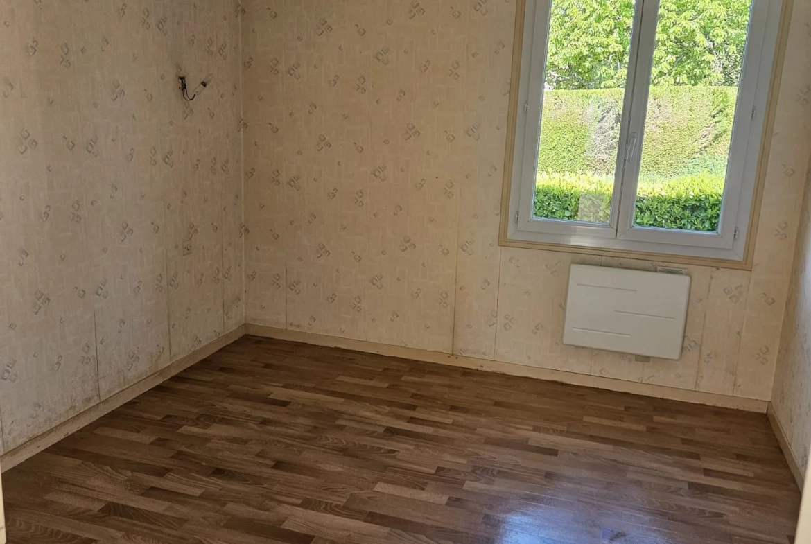 Maison de plain-pied à Condat-sur-Vienne avec jardin et garage, 48 m² 