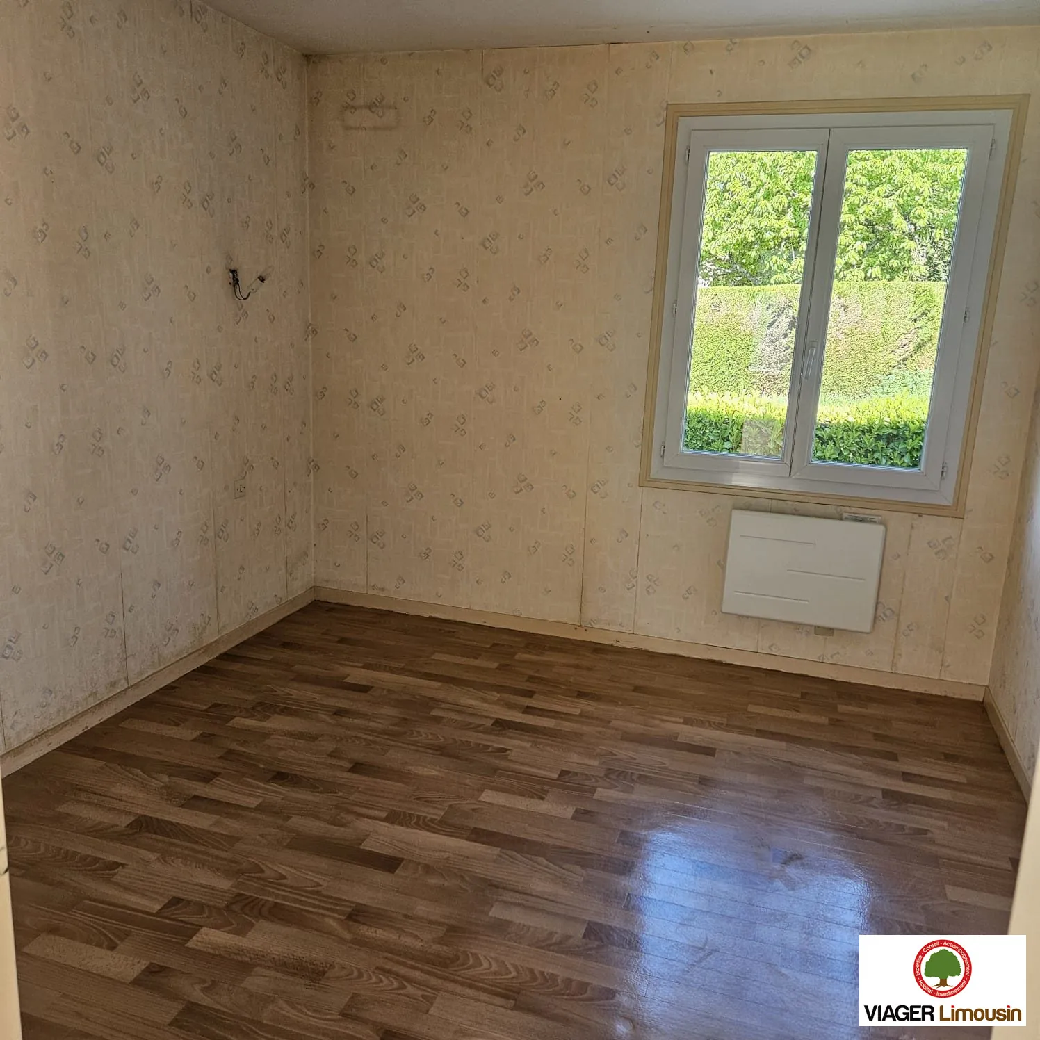 Maison de plain-pied à Condat-sur-Vienne avec jardin et garage, 48 m² 