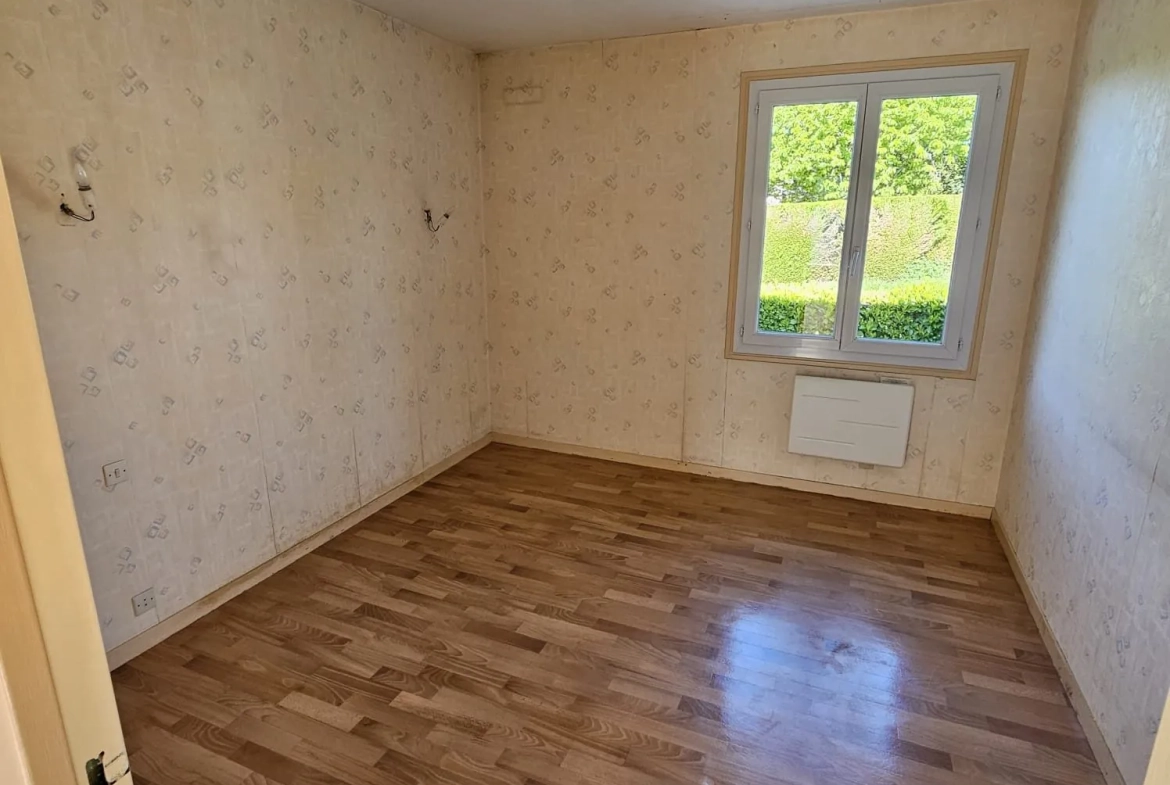 Maison de plain-pied à Condat-sur-Vienne avec jardin et garage, 48 m² 
