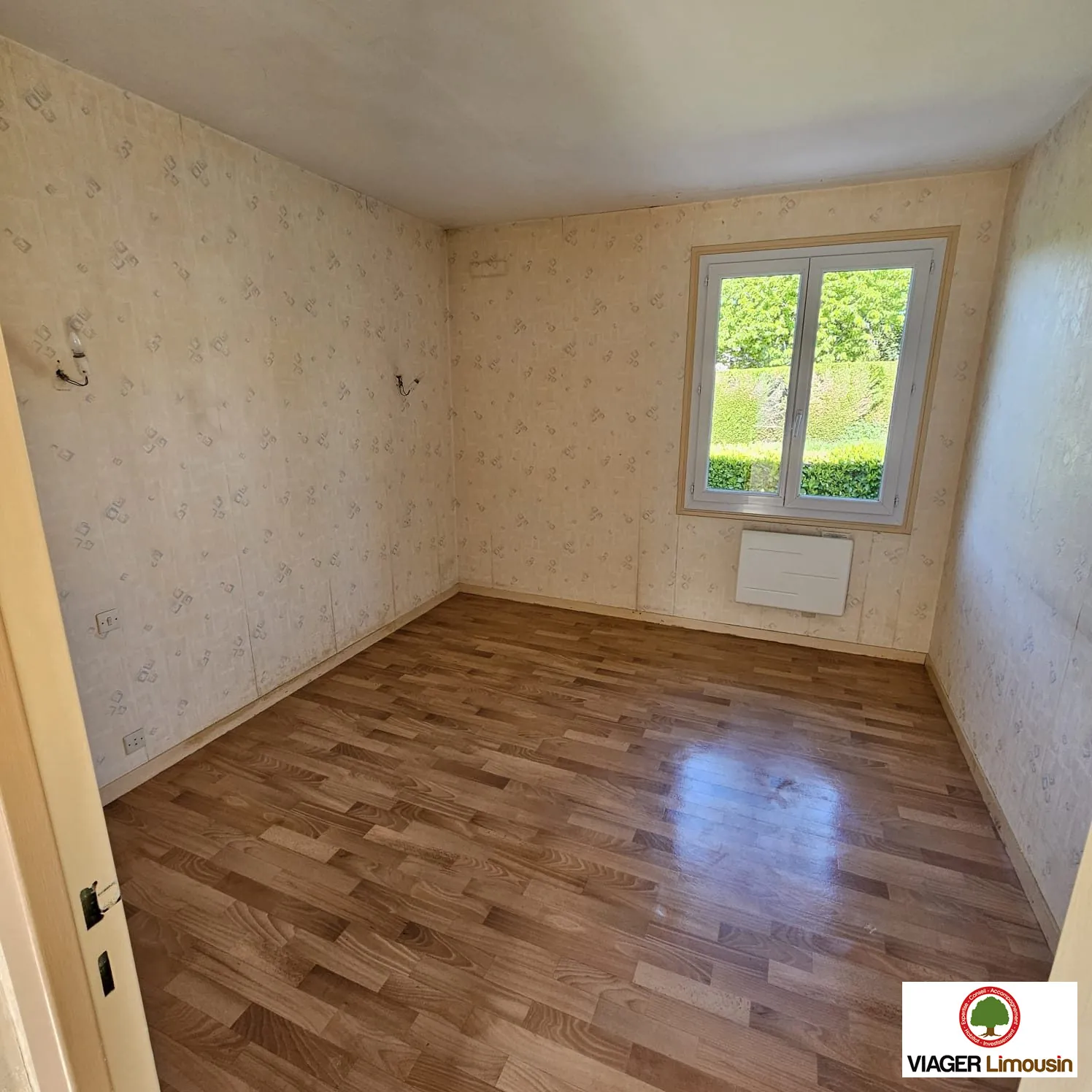 Maison de plain-pied à Condat-sur-Vienne avec jardin et garage, 48 m² 