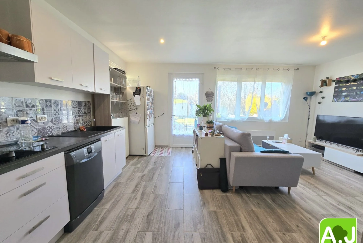 Ensemble immobilier avec maison et studio à Gravigny, emplacement idéal 