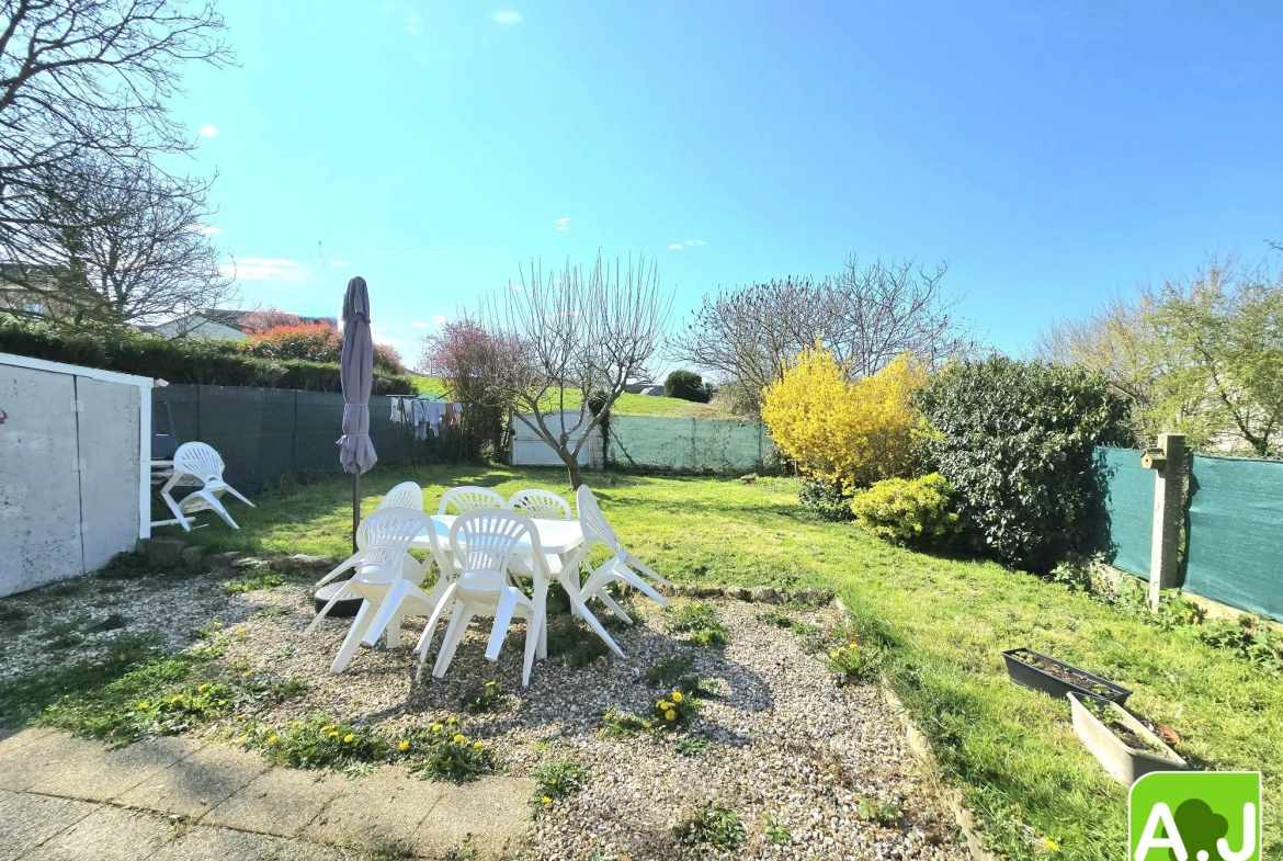 Ensemble immobilier avec maison et studio à Gravigny, emplacement idéal 