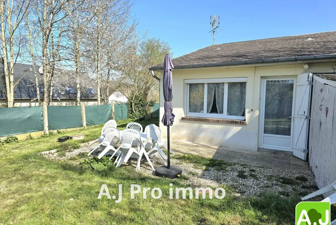 Ensemble immobilier avec maison et studio à Gravigny, emplacement idéal 
