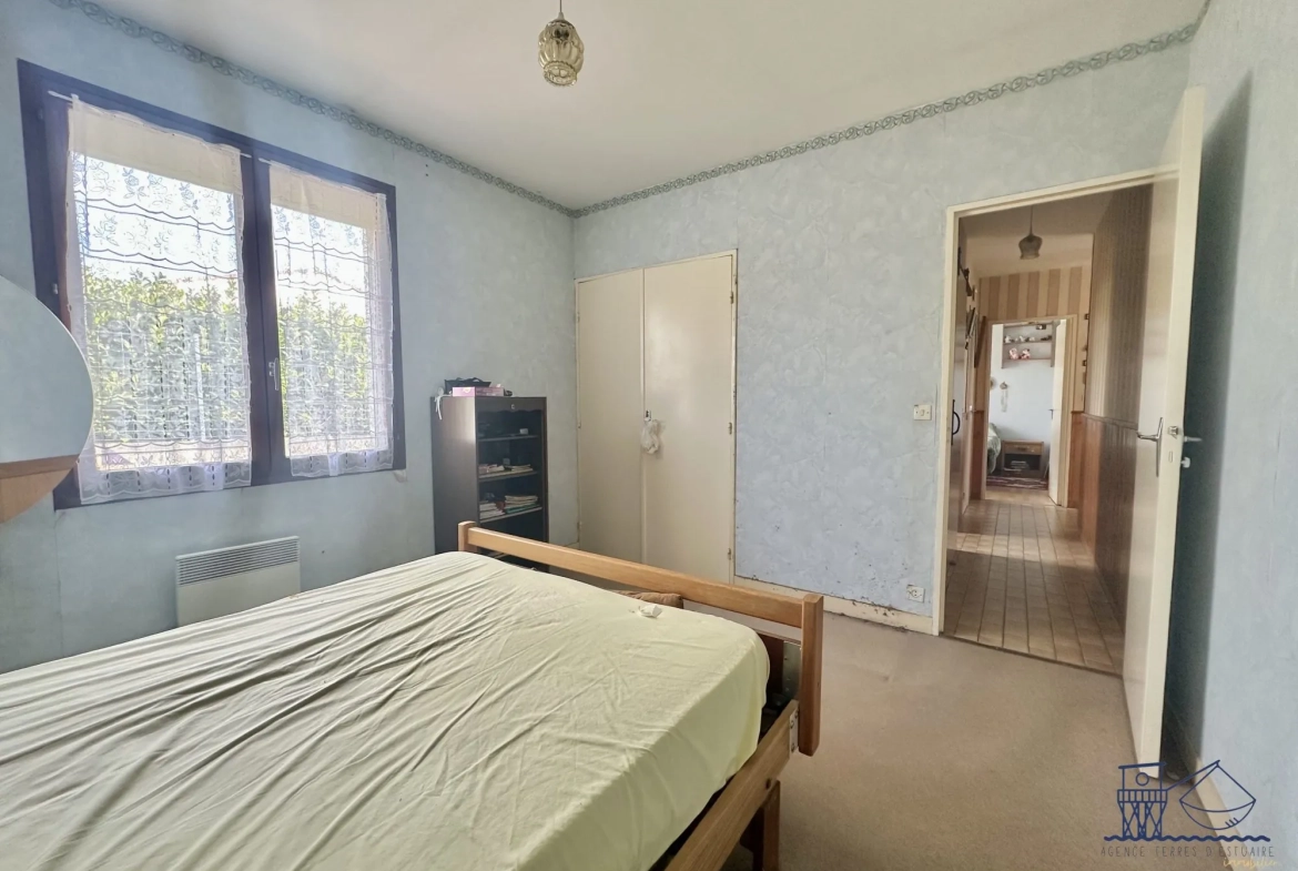 Maison à vendre à Floirac avec grand terrain, luminosité et potentiel 