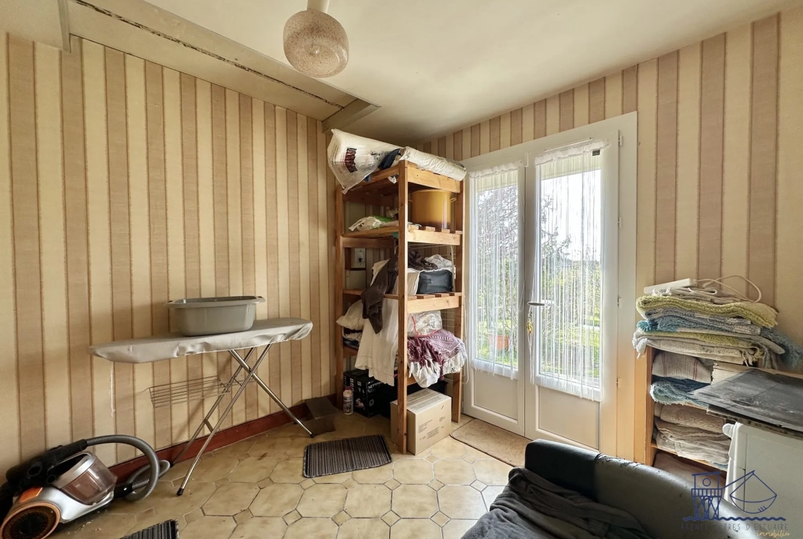 Maison à vendre à Floirac avec grand terrain, luminosité et potentiel 
