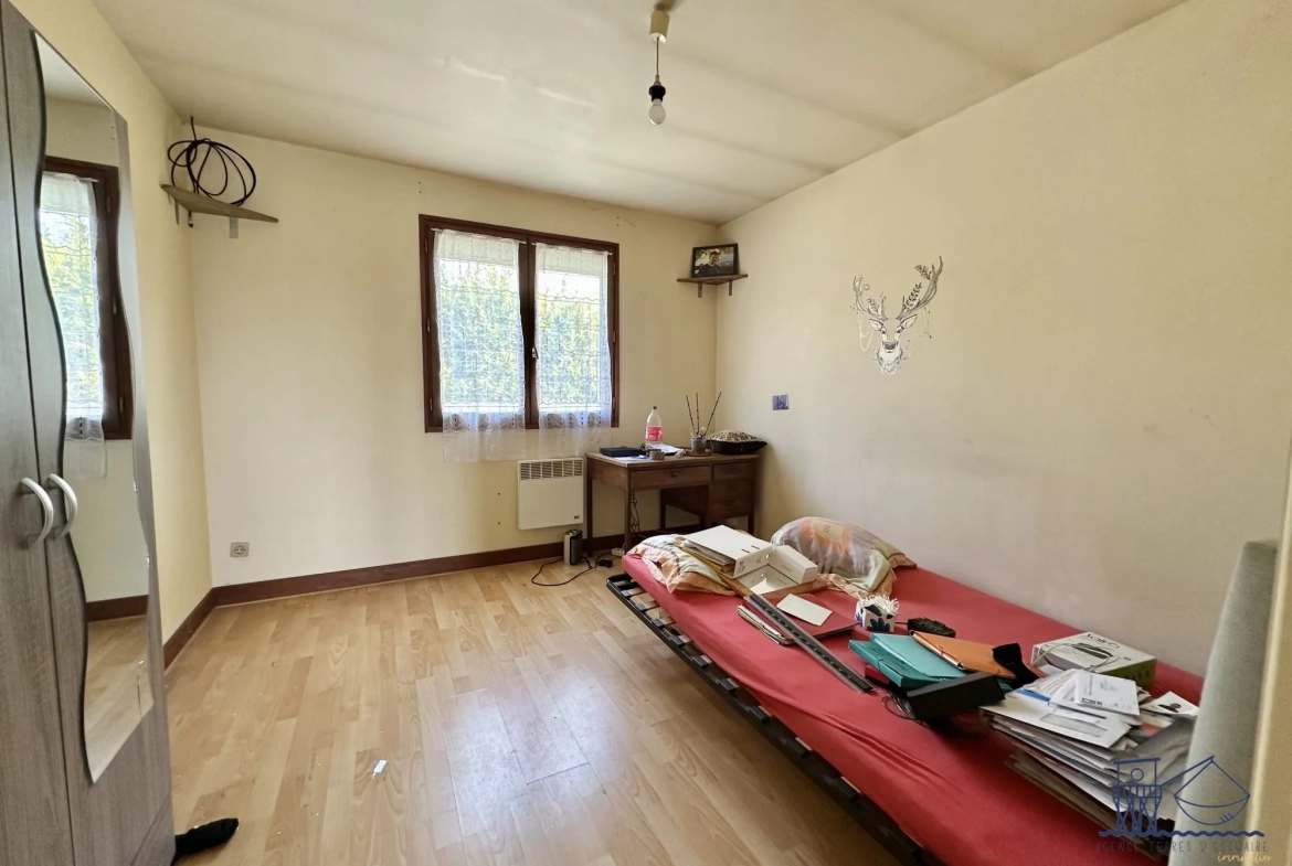 Maison à vendre à Floirac avec grand terrain, luminosité et potentiel 
