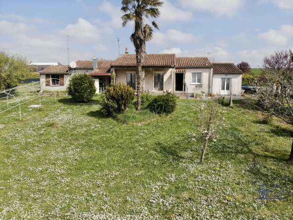 Maison à vendre à Floirac avec grand terrain, luminosité et potentiel