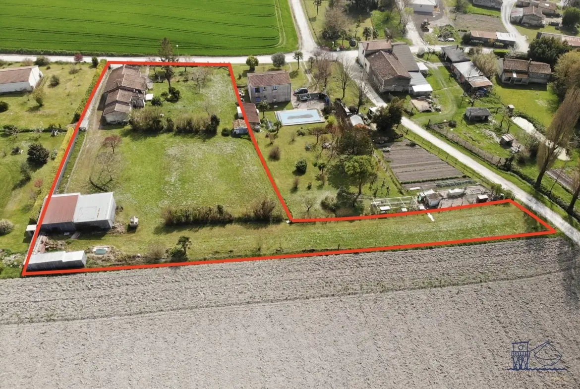 Maison à vendre à Floirac avec grand terrain, luminosité et potentiel 
