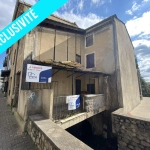 Maison à rénover de 110 m² à Pont d'Aubenas avec terrasse et cave