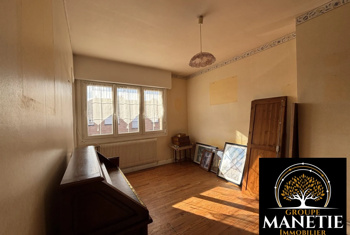 Maison familiale de 3 chambres à Arras avec garage et véranda 