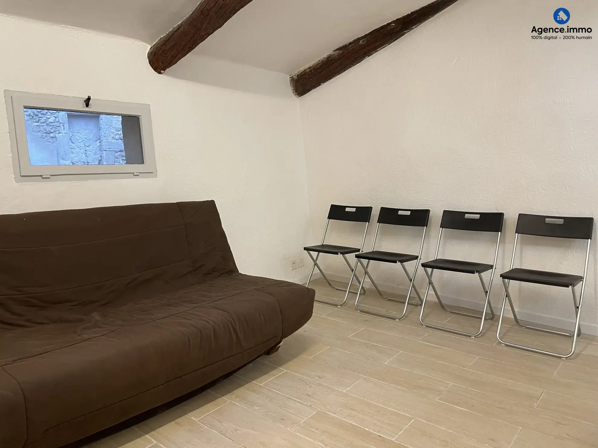 Séjour_appartement_36m²_Béziers_centre_ville Appartement T1 rénové 35,35 m² à Béziers - Dernier étage avec vue 