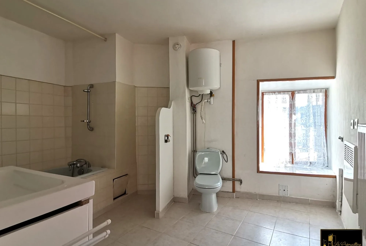 Maison à vendre à Dourdan avec jardin, 3 chambres, proche Paris 