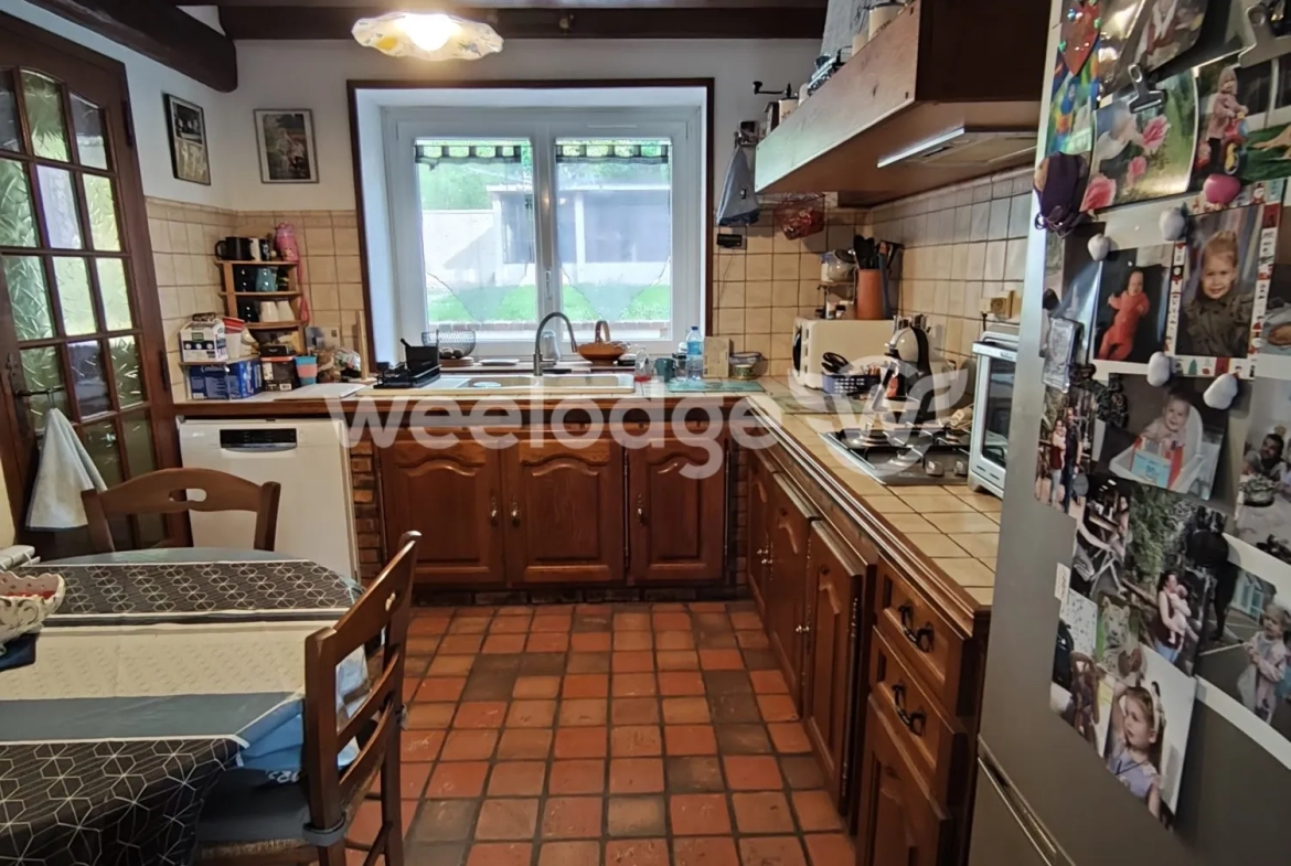 Magnifique maison ancienne de 102 m² avec 2 garages et terrain à Les Authieux-sur-le-Port-Saint-Ouen 