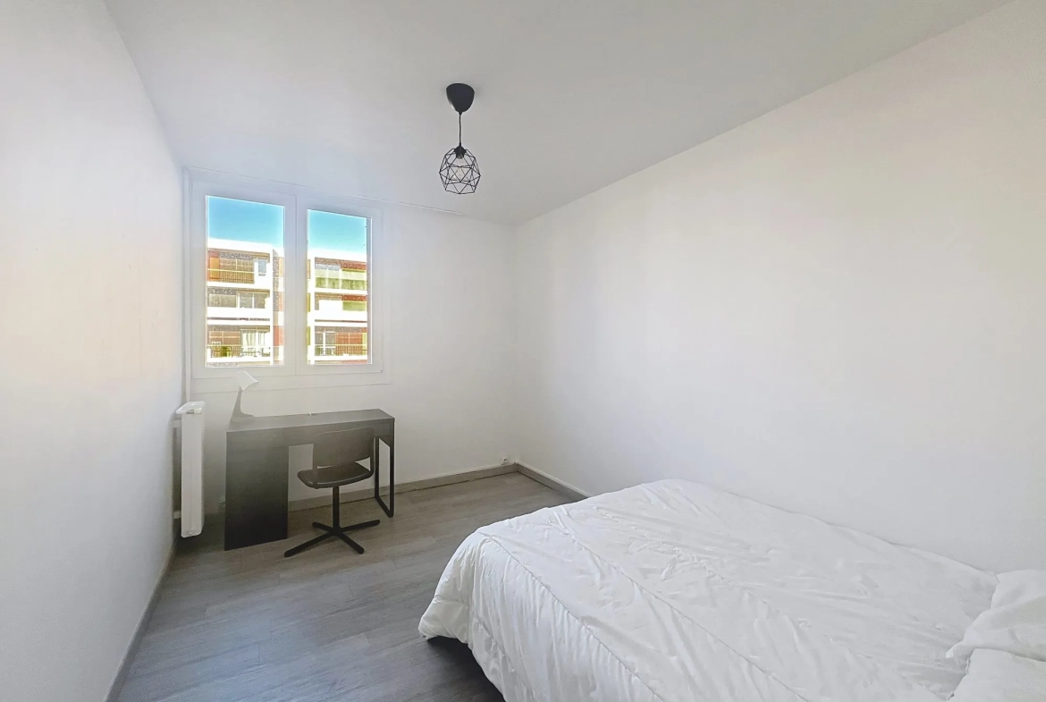 Investissez dans un appartement T4 rénové avec balcon et cave à Saint-Brieuc 
