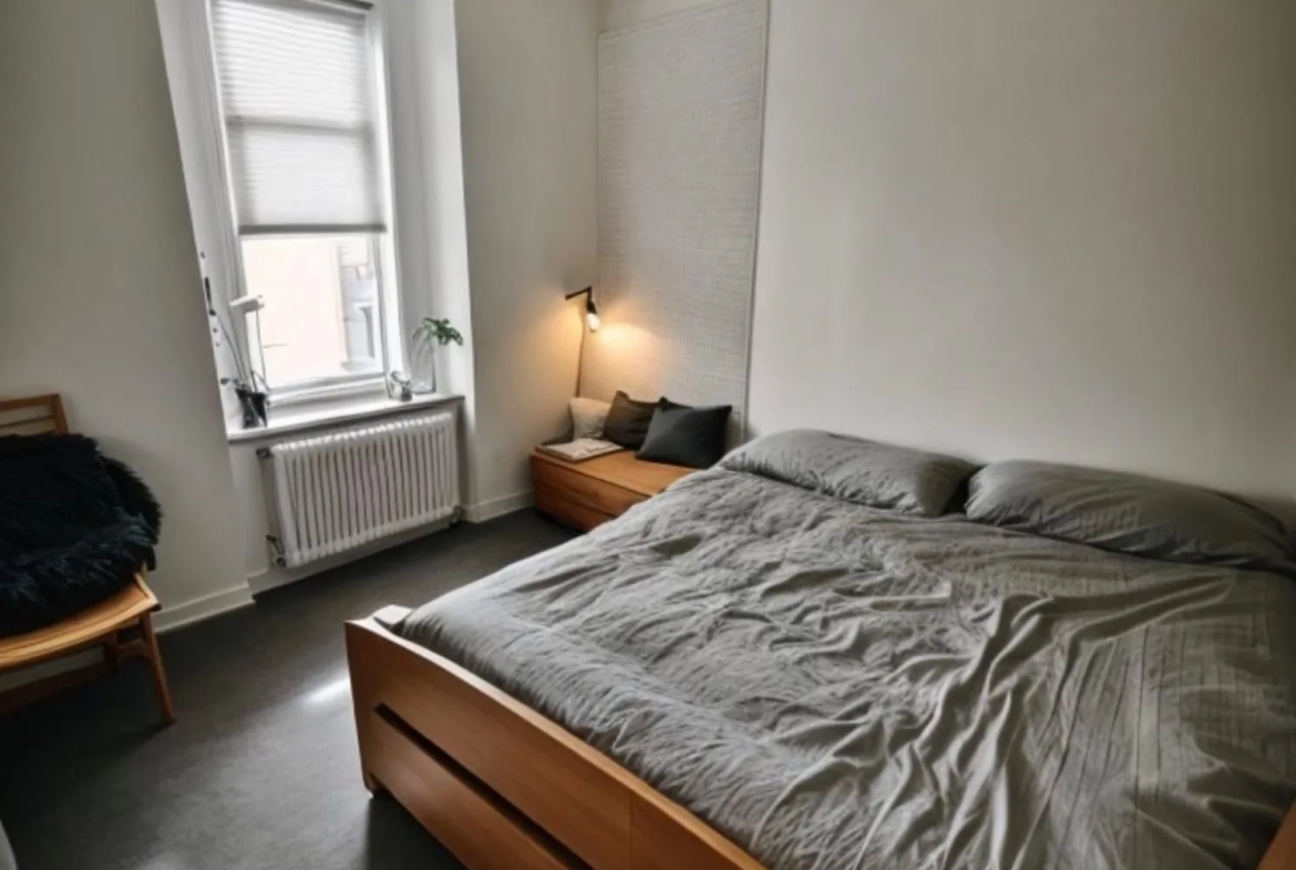 Appartement F4 loué à Herserange avec cave et garage, investissement sûr 