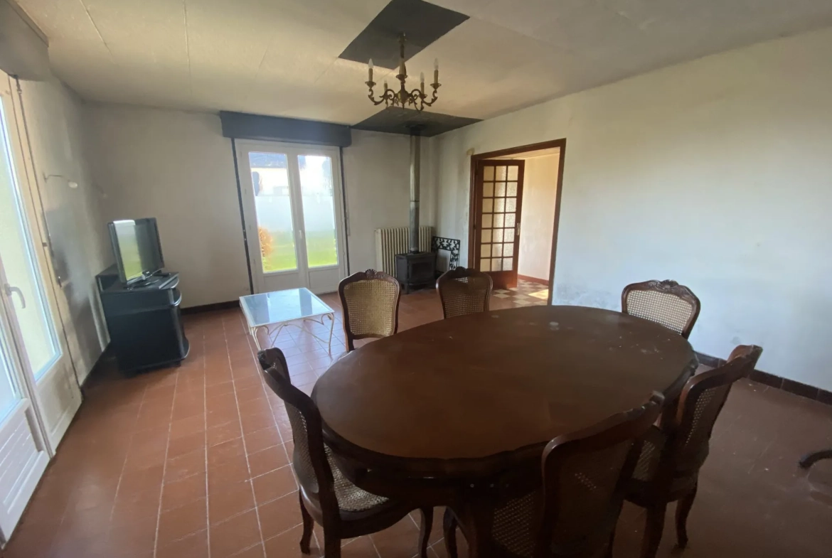 Maison à vendre à Languidic avec 5 chambres et garage - Potentiel de rénovation 