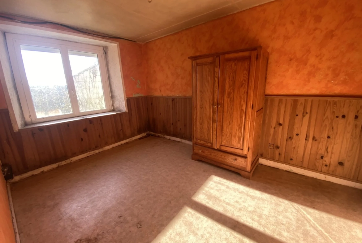 Maison à vendre à Languidic avec 5 chambres et garage - Potentiel de rénovation 