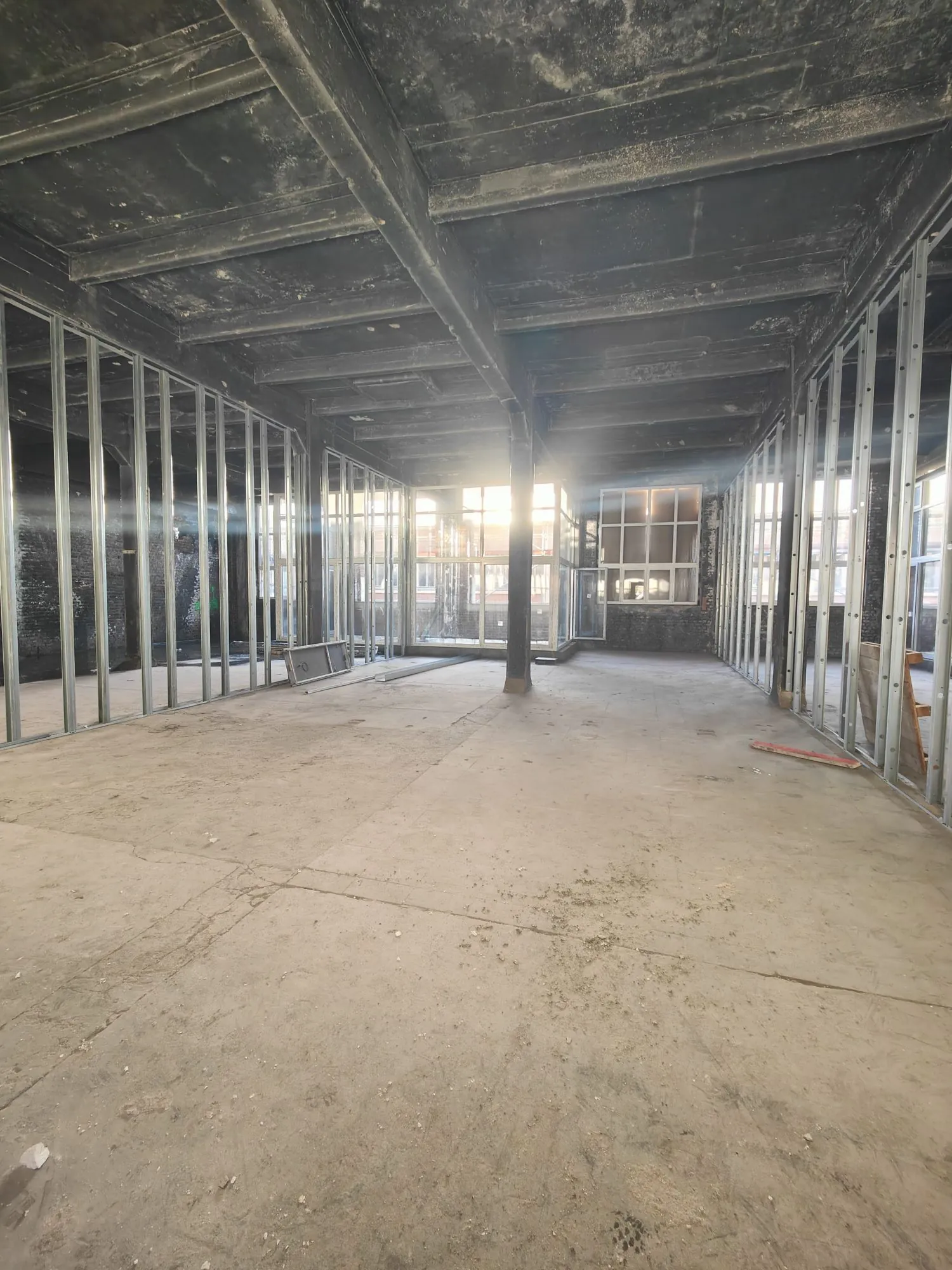 Loft brut à aménager dans la Lainière Résidence à Roubaix 