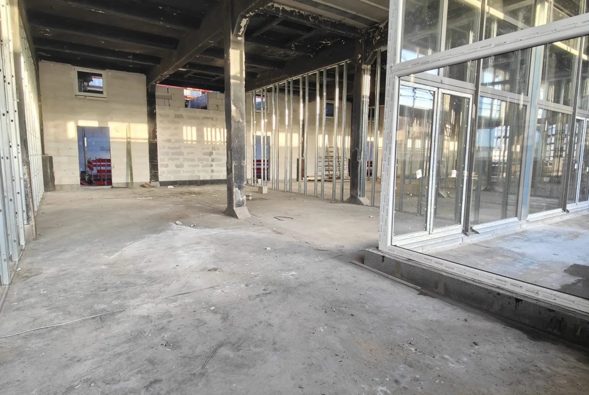 Loft brut à aménager dans la Lainière Résidence à Roubaix 