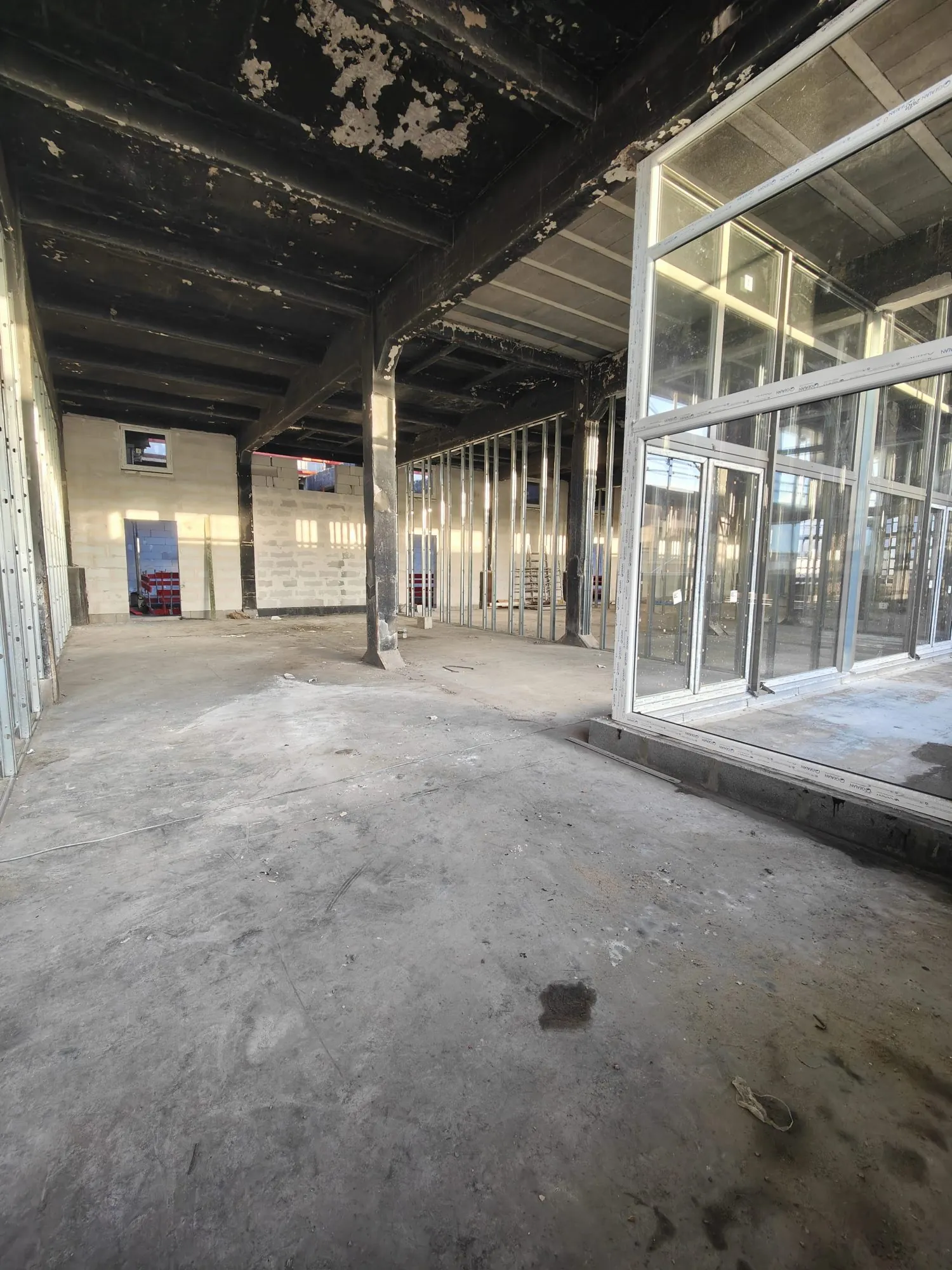 Loft brut à aménager dans la Lainière Résidence à Roubaix 