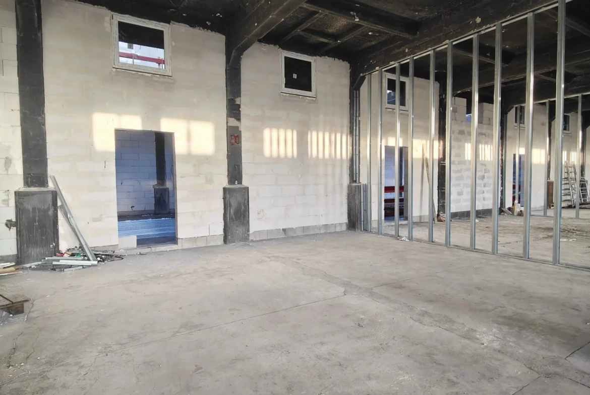 Loft brut à aménager dans la Lainière Résidence à Roubaix 