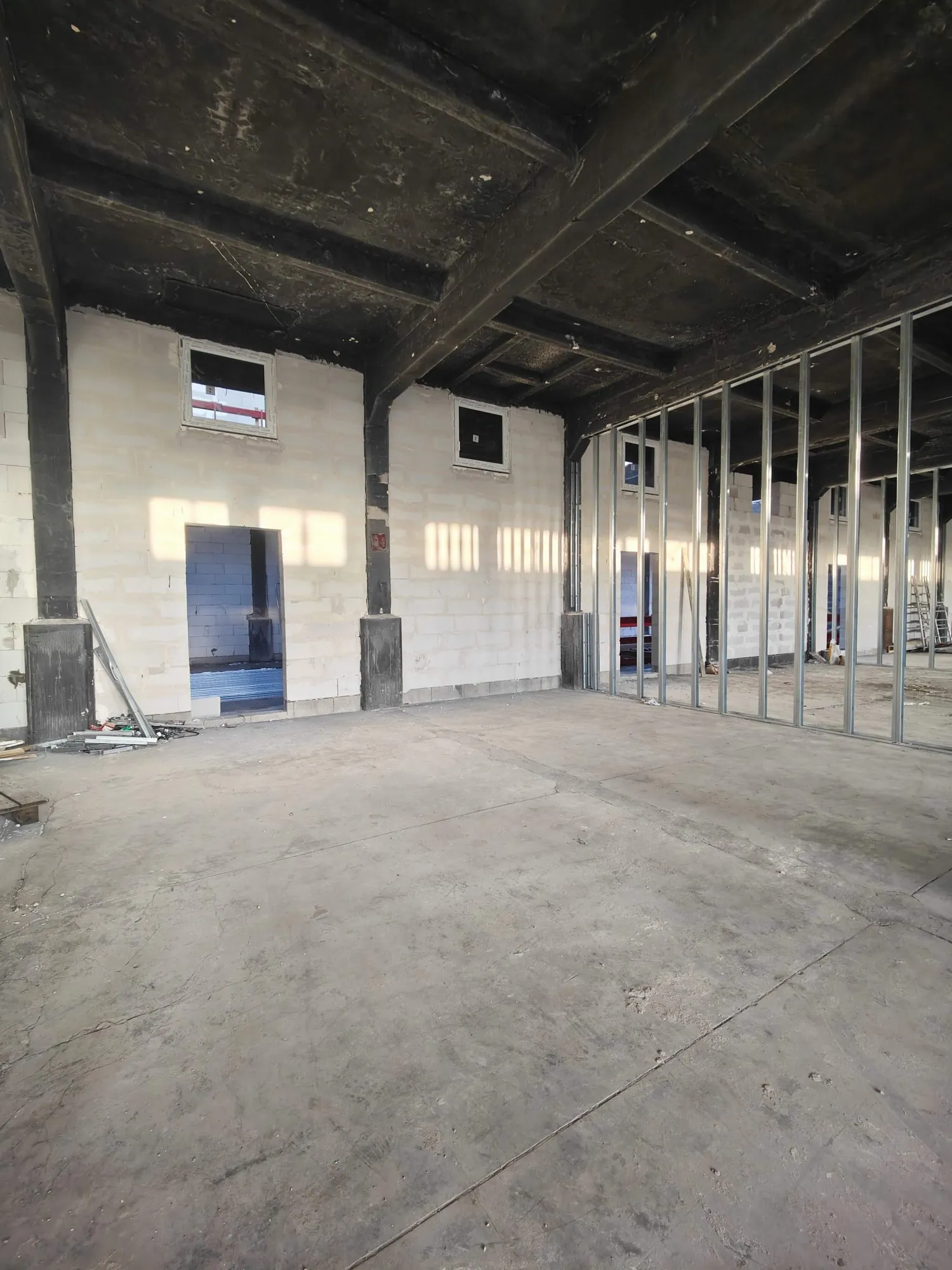 Loft brut à aménager dans la Lainière Résidence à Roubaix 