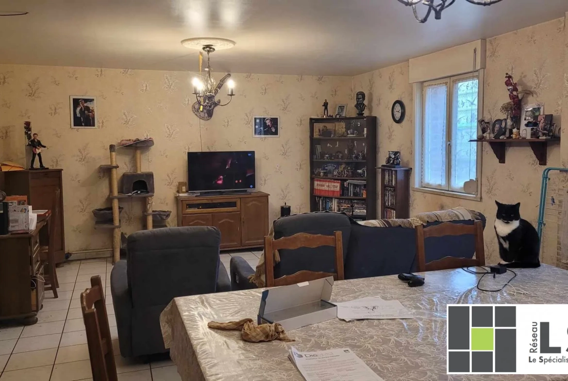 Charmante maison familiale à Ferrière-la-Grande avec jardin et potentiel 
