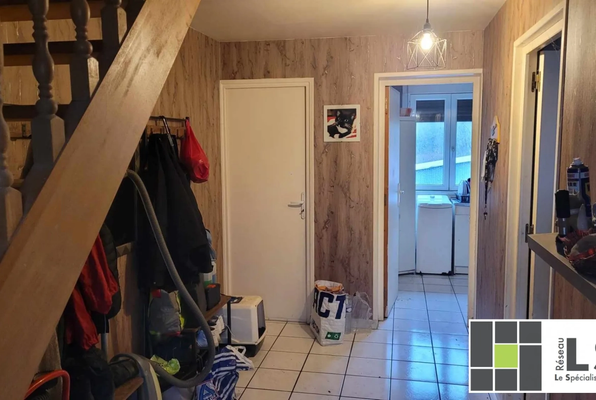 Charmante maison familiale à Ferrière-la-Grande avec jardin et potentiel 