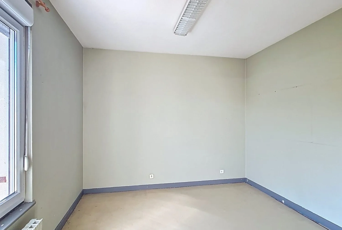 Immeuble à vendre à Gueugnon avec potentiel de location et travaux à prévoir 