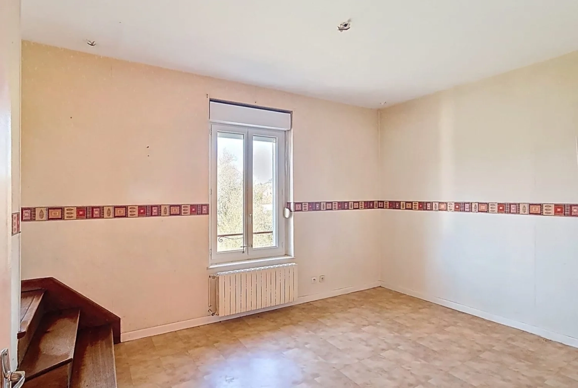 Immeuble à vendre à Gueugnon avec potentiel de location et travaux à prévoir 