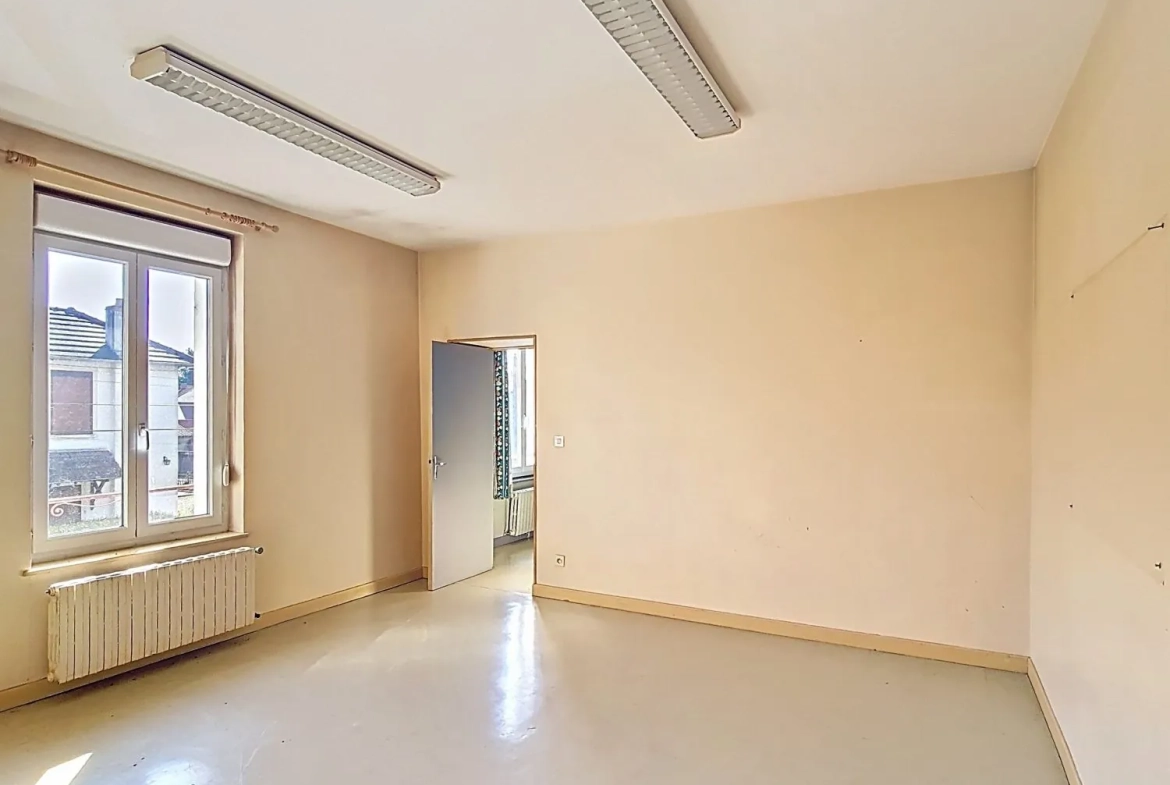 Immeuble à vendre à Gueugnon avec potentiel de location et travaux à prévoir 