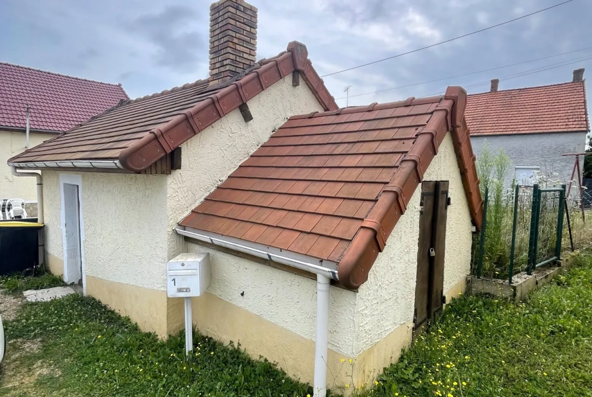 Maison de plain-pied rénovée à Champvert avec potentiel d'agrandissement 