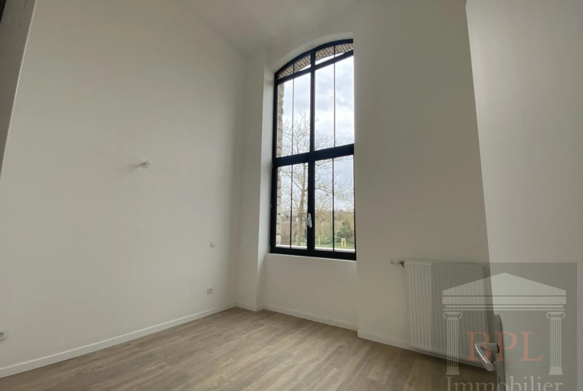 Appartement loft neuf avec hauts plafonds et parking à Champagne-sur-Seine 
