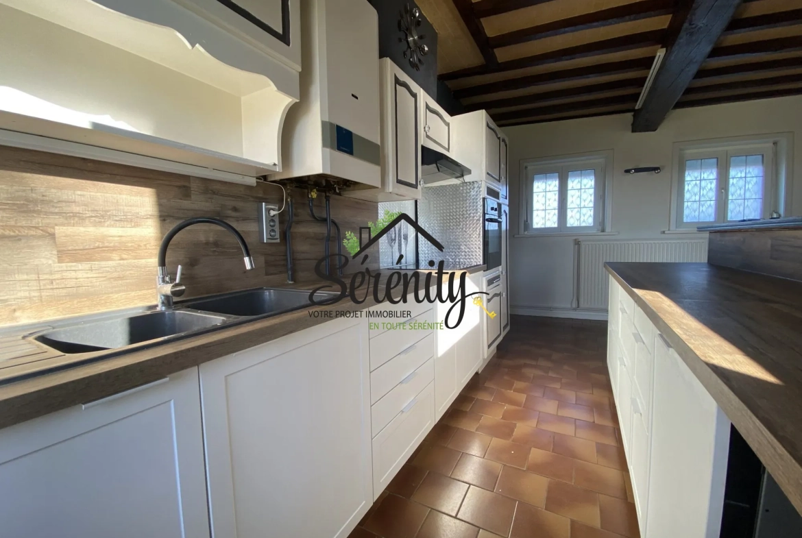 Maison individuelle de 95 m² à Honnechy avec jardin et garages - Secteur calme 