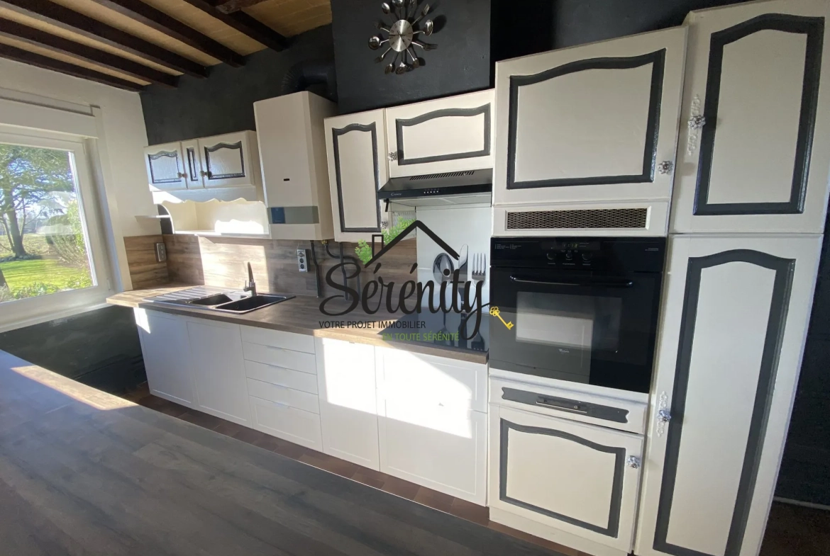 Maison individuelle de 95 m² à Honnechy avec jardin et garages - Secteur calme 