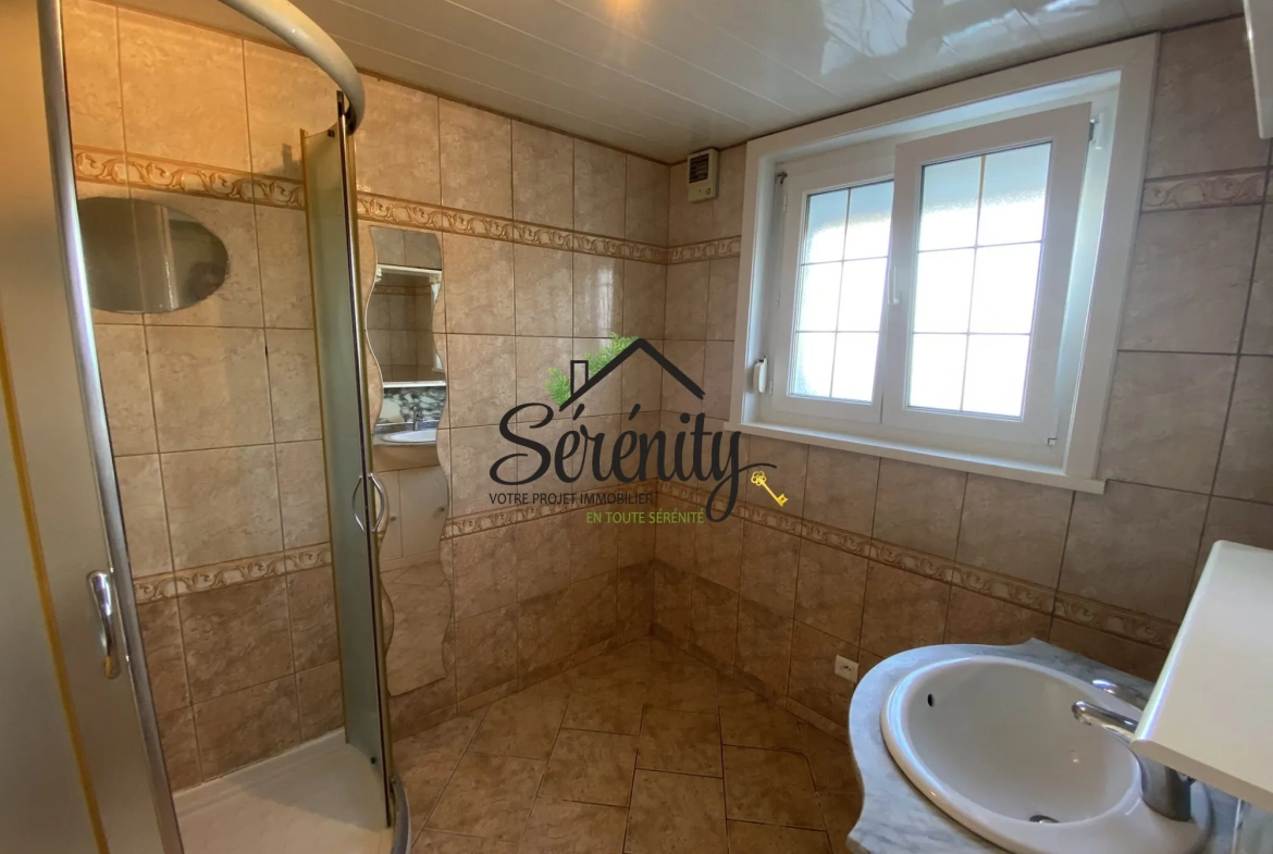 Maison individuelle de 95 m² à Honnechy avec jardin et garages - Secteur calme 