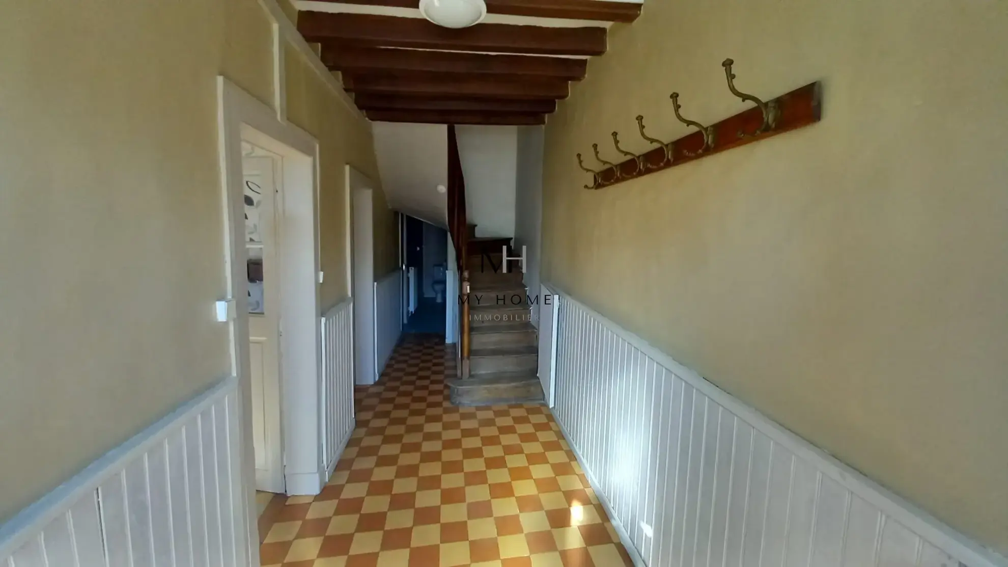Maison de village à vendre dans le Perche avec jardin et combles aménageables 
