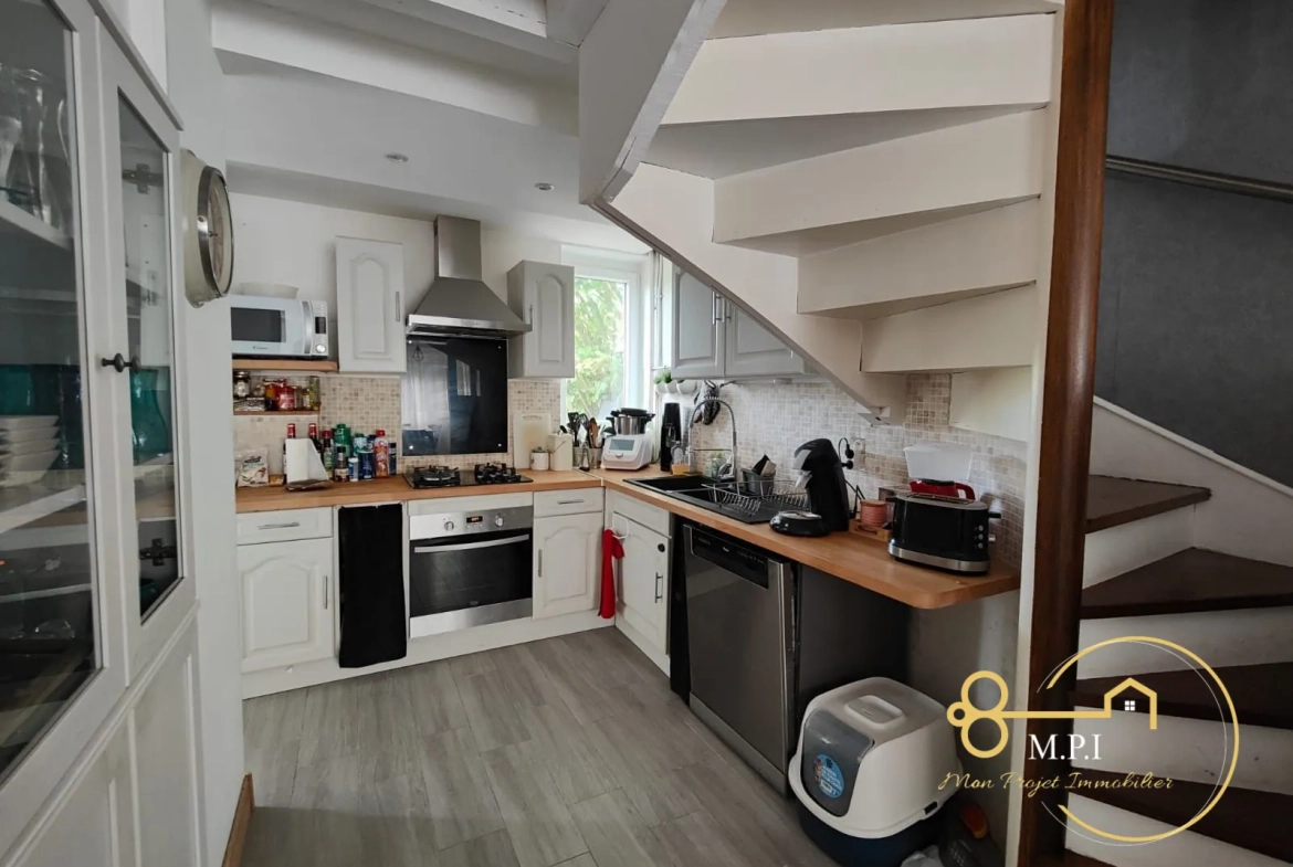 Maison en pierre à vendre près d'Alençon avec garage et terrain clos 